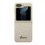 Guess Samsung Galaxy Z Flip 5 Skal Glitter Flakes Metal Logo Guld
